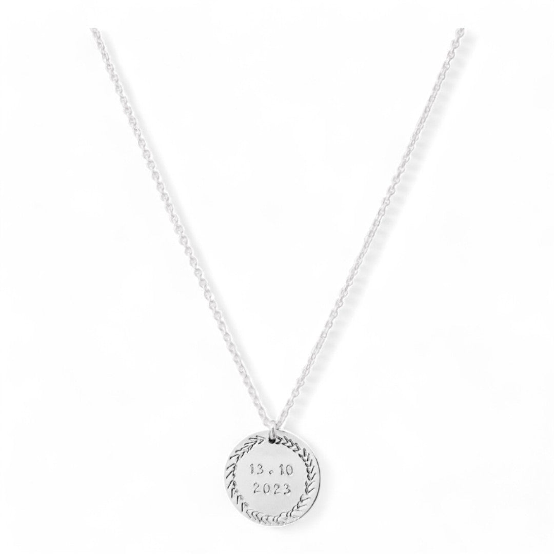 Ketting zilver met sierrand datum