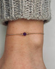 Gouden damesarmband met in het midden een geboortesteen