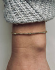 Gouden dames armband Pip
3 en 2 mm gouden kraaltjes afgewisseld
