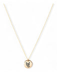 Gouden dames ketting, aan de ketting hangt een 10 mm bedel met sterrenbeeld