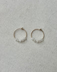 Gouden hoops met facet geslepen maansteentjes