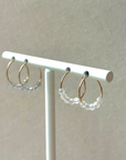 Gouden hoops met facet geslepen maansteentjes