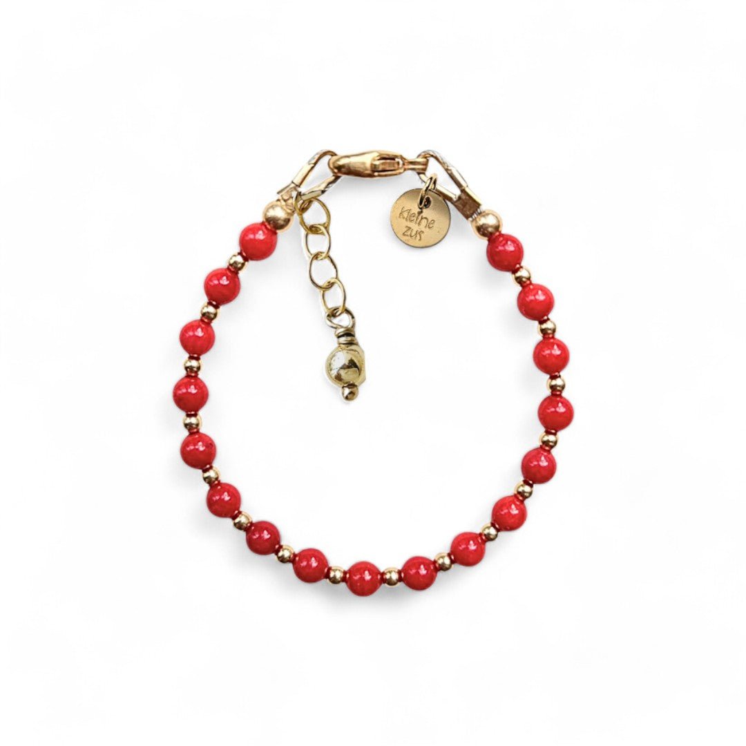 Gouden babyarmbandje Lauren gemaakt van 2 mm kraaltjes en bloedkoraal