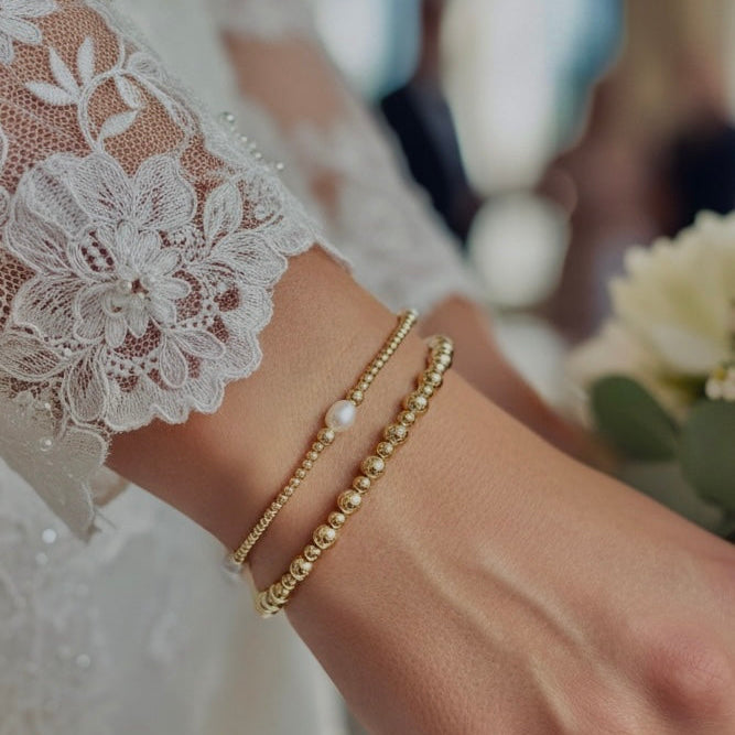 Gouden armband met 2 en 3mm kralen