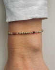 Gouden damesarmband Marilou met zonnesteen en goudsteen 