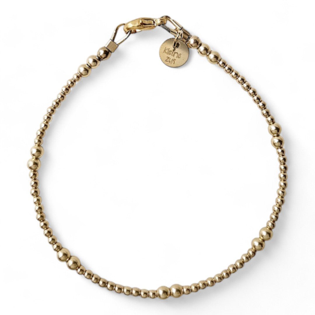 Gouden damesarmband Pip gemaakt van 2 en 3 mm kraaltjes