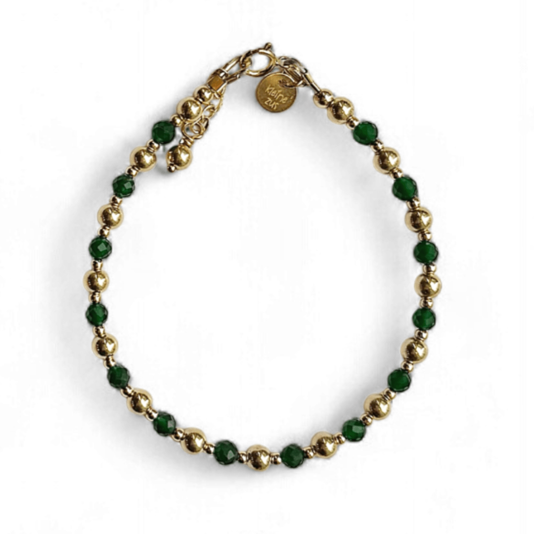 Gouden dames armband gemaakt van 3mm gouden kralen in combinatie met edelsteen 