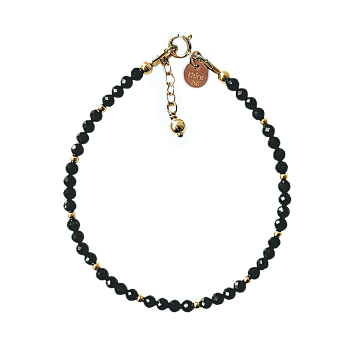 Gouden dames armband gemaakt van 3mm gouden kralen in combinatie met edelsteen 